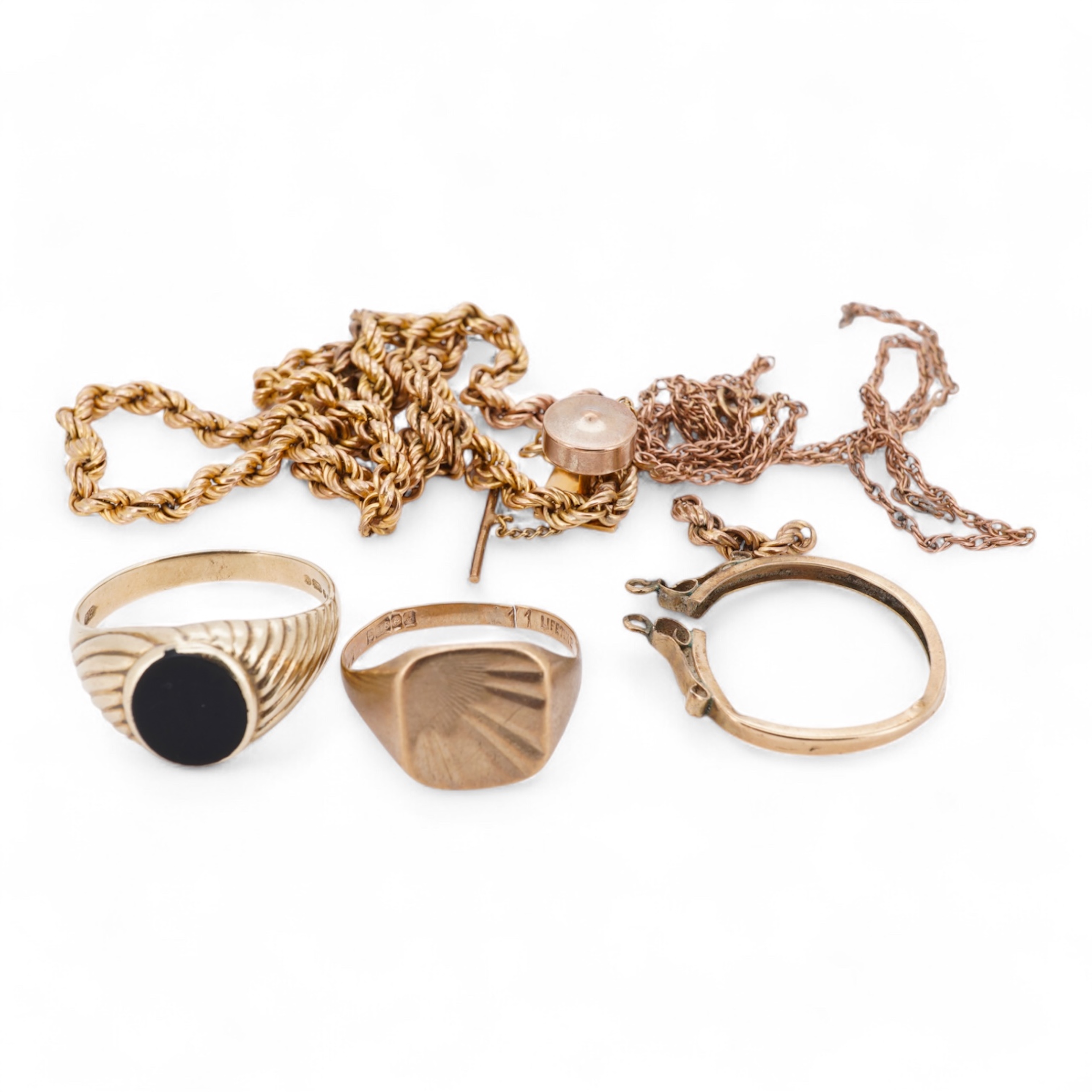 A 1960's 9ct gold and black onyx set signet ring, size X, one other 9ct gold signet ring, a 9ct gold dress stud, a 9ct gold pendant mount and two damaged 9k necklaces, gross weight 21 grams.